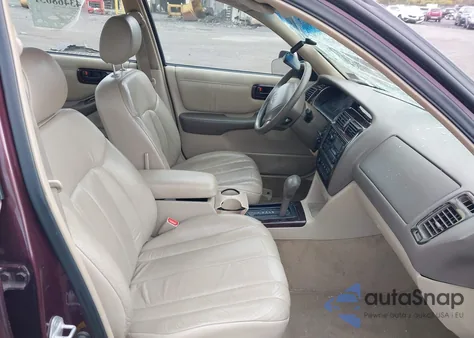 1999 Toyota Avalon Xls z USA, uszkodzony, nr VIN 4T1BF18BXXU299725